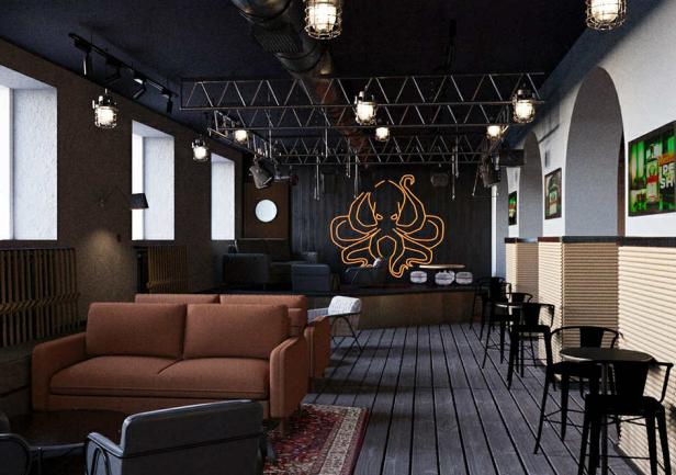 Wnętrze klubu Bukszpryt, w głębi na ścianie logo klubu